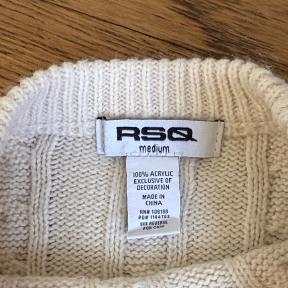 RSQ Cream Cable Knit Sweater with Black Bows - Picture 2 of 3